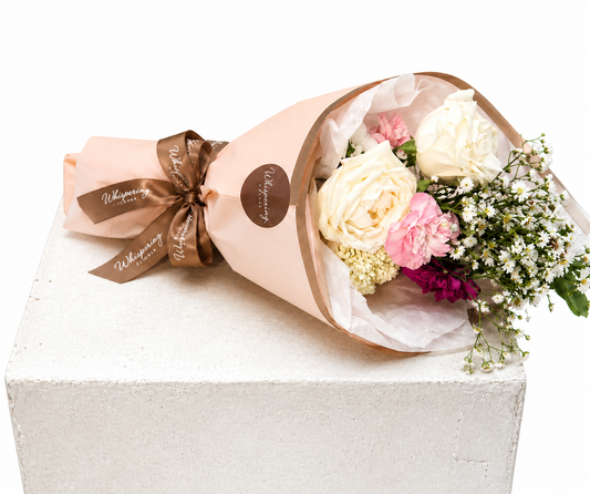 Madi's Posy Mother's Day bouquet — white roses, pink carnations, and burgundy blooms designed by 12-year-old Madi at Whispering Flower, Mount Wellington Auckland.