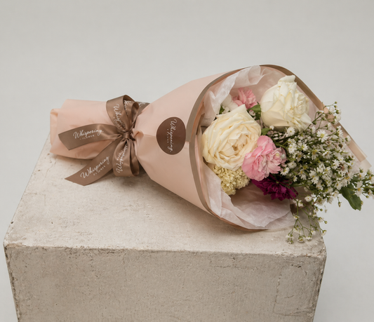 Madi's Posy Mother's Day bouquet — white roses, pink carnations, and burgundy blooms designed by 12-year-old Madi at Whispering Flower, Mount Wellington Auckland.