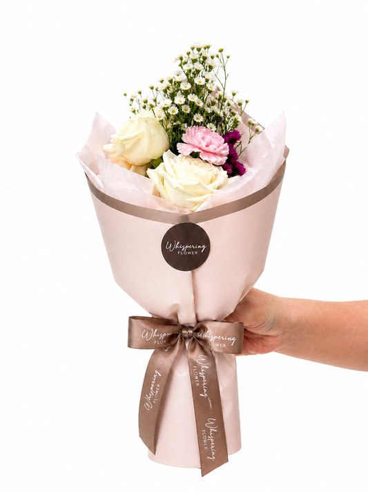 Madi's Posy Mother's Day bouquet — white roses, pink carnations, and burgundy blooms designed by 12-year-old Madi at Whispering Flower, Mount Wellington Auckland.